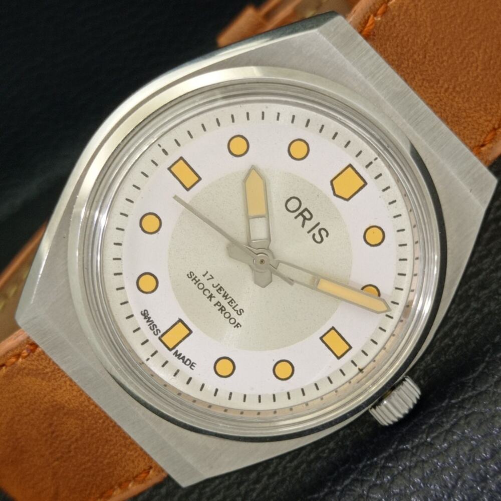 Oris Men's Silver and Tan Watch